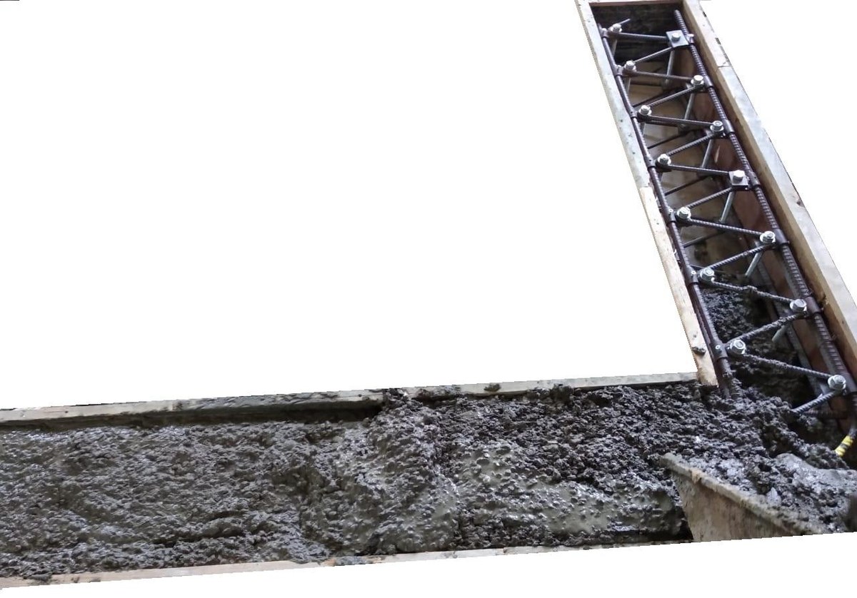 The rebar truss in the formwork of a knee joint specimen during casting.
