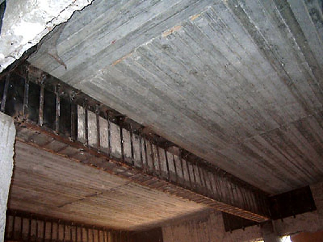 Field loading test of the retrofitted beam.