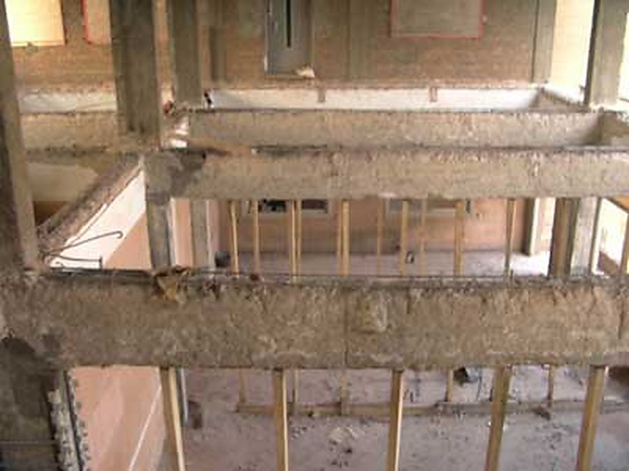 Damaged concrete frame before strengthening.