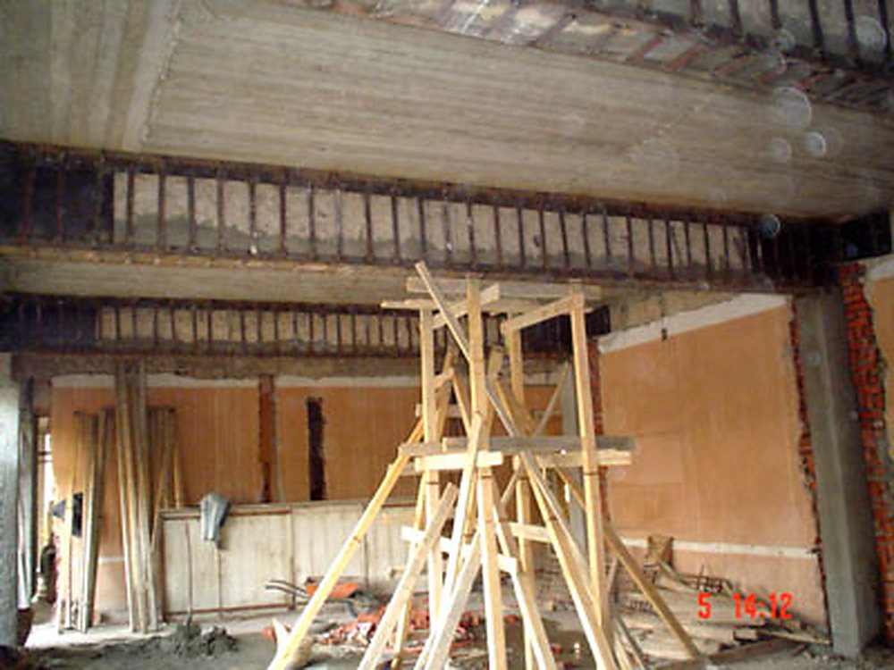 Strengthening work in progress on a concrete frame.